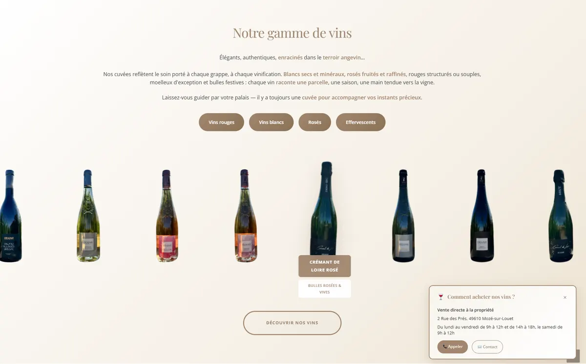 Section « Notre gamme de vins » du site Domaine Delaunay : filtres par type de vin, bouteilles alignées et encart donnant l'adresse et les horaires de la cave